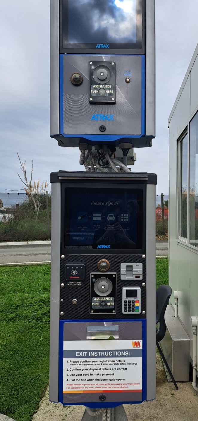 Image of the contactless sign in system on the weighbridge using a touch screen and vehicle number plate recognition